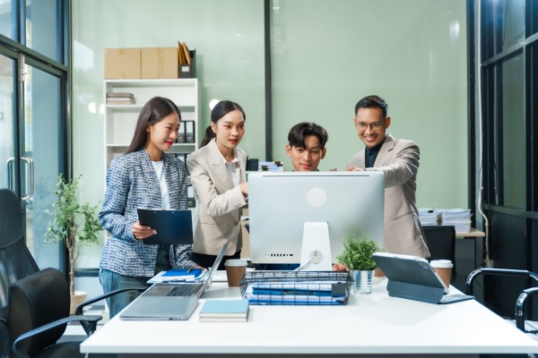 Asian business team collaborating in an office
