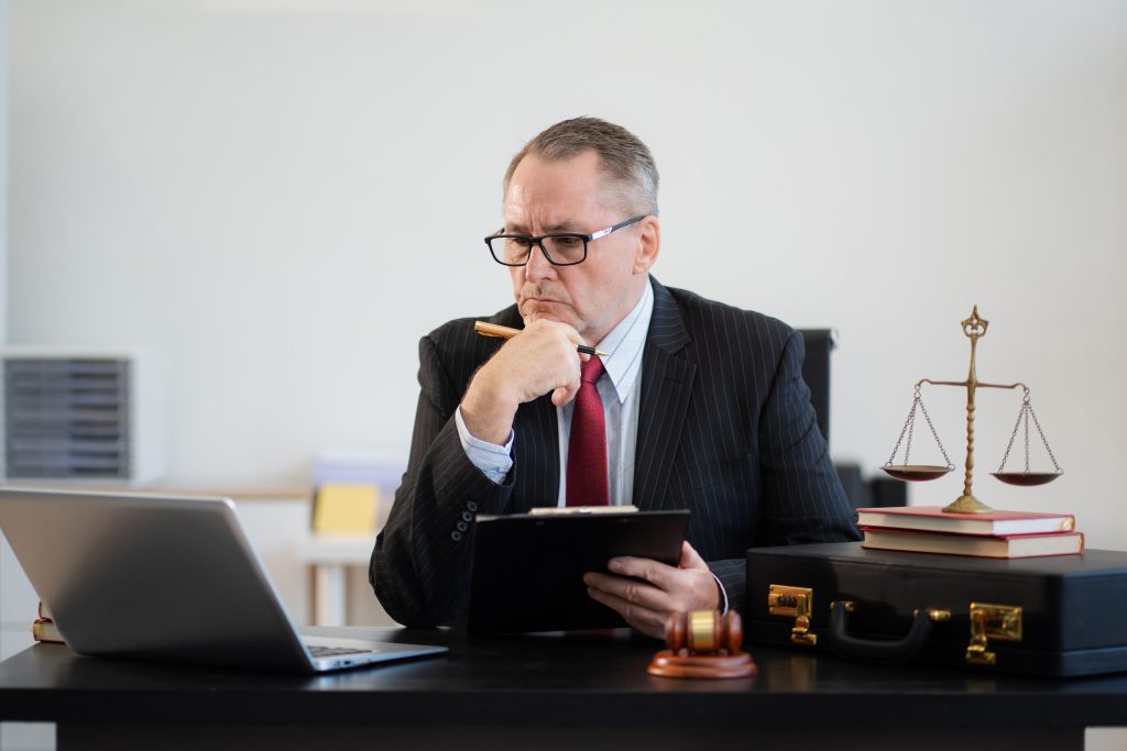 Lawyer working at a desk in a law office